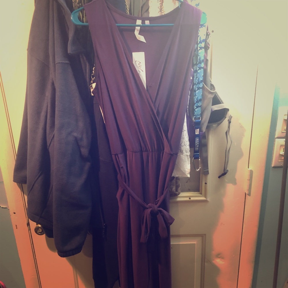 NEW WITH TAGS! Purple jumpsuit!